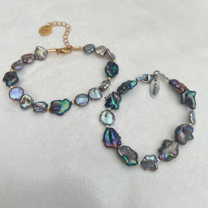 Armband mit cremefarbenen und schwarzen Süßwasserperlen